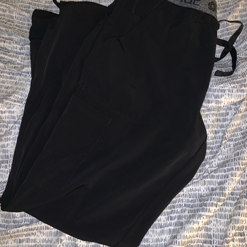 Size small scrubs (2 pairs)